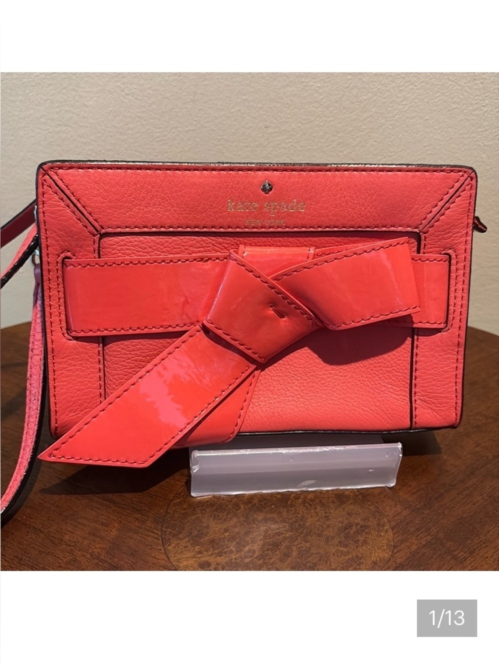 Kate Spade wristlet pebble leather/patent bow on front orangeish red gold NWOT